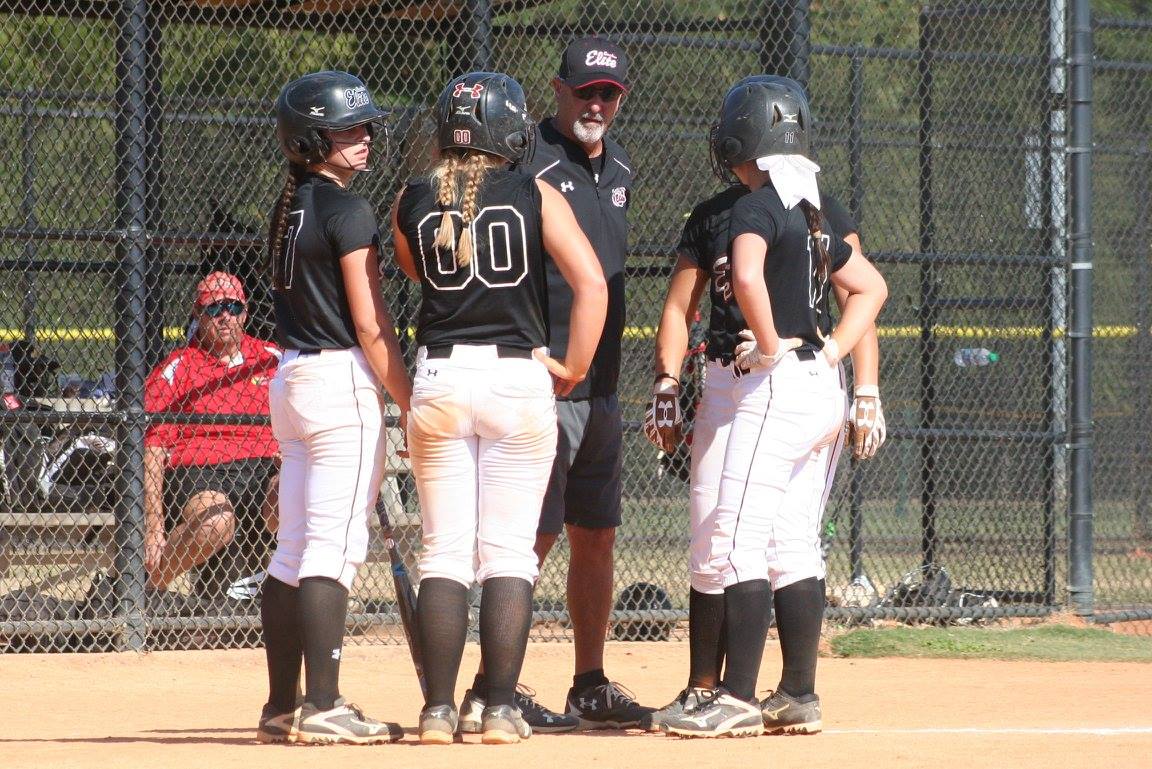 Coach Tony Genovese on the field with his Carolina Elite team