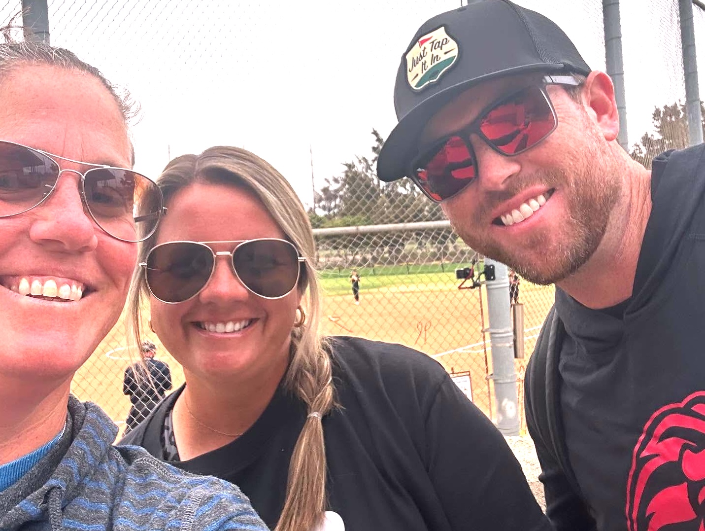 Coach Brittany Lewis (center) with assistants Barb Sherwood and Ty Lewis.