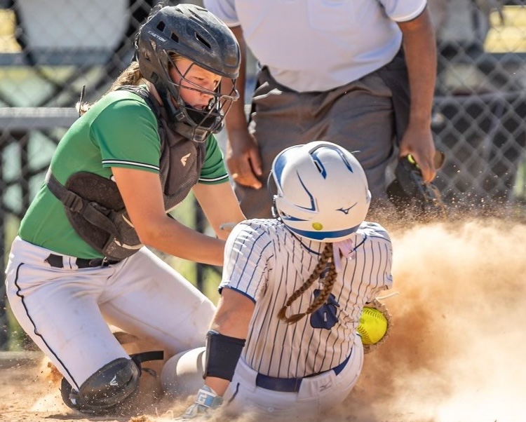 Laini Michaelis makes the tag at home for the out