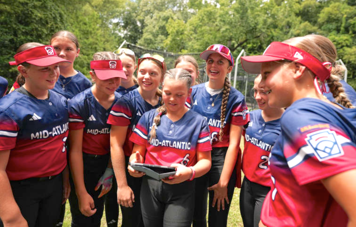 The Mid-Atlantic team (Pennsylvania) celebrates after winning the Little League Softball World Series on Sunday