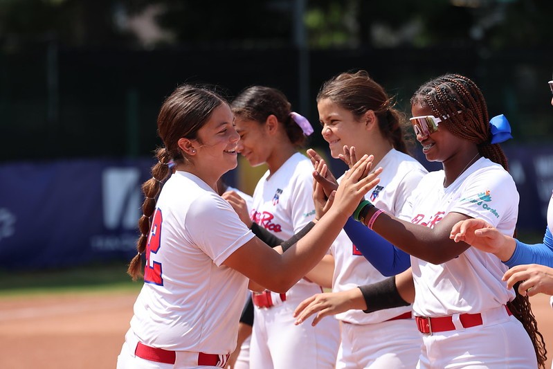 Naimi Melendez greets her team during pregame introductions