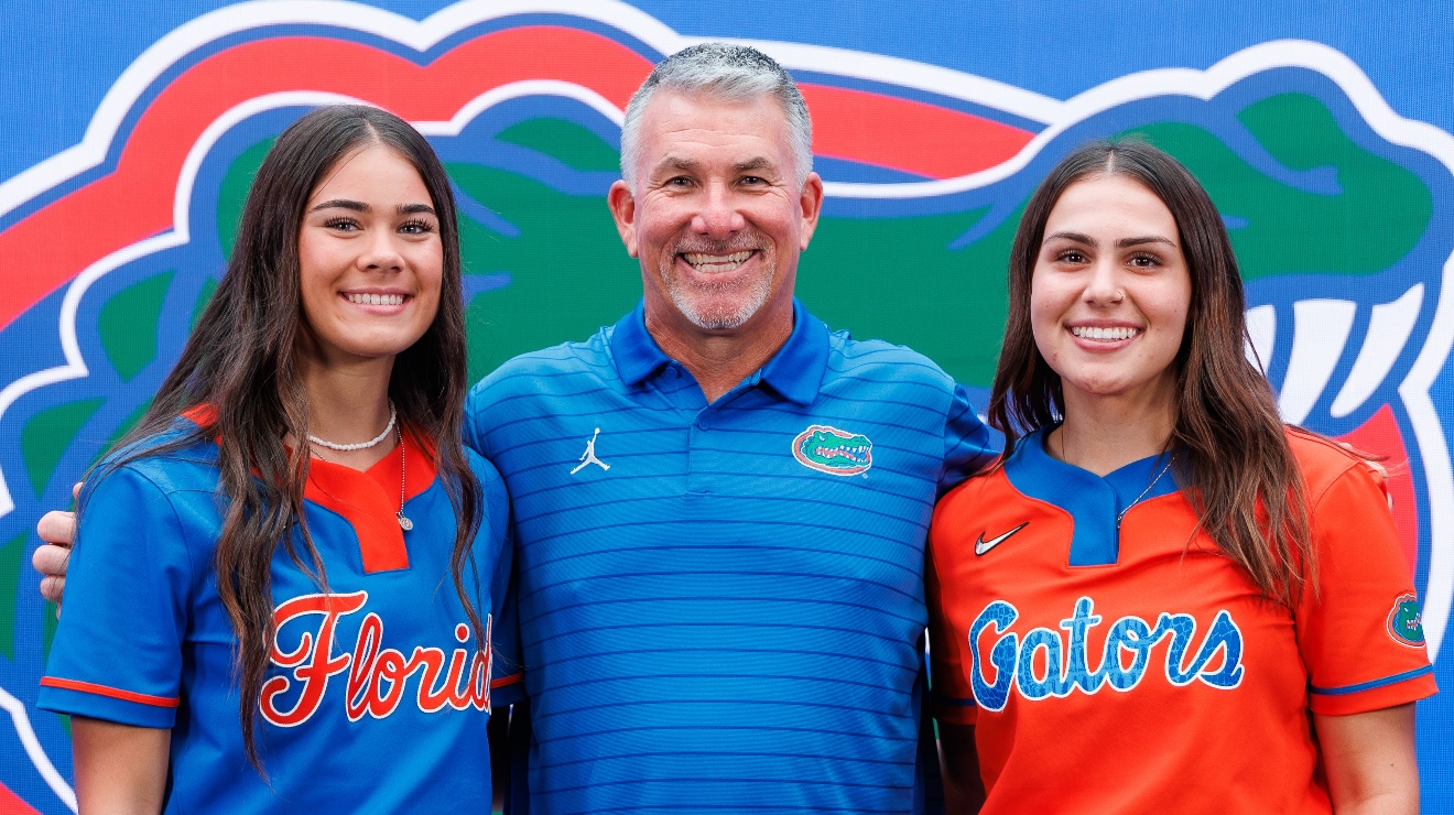 Taylor Jennings (left) and Niayli Calvo (right) with Florida Head Coach Tim Walton CROPPED