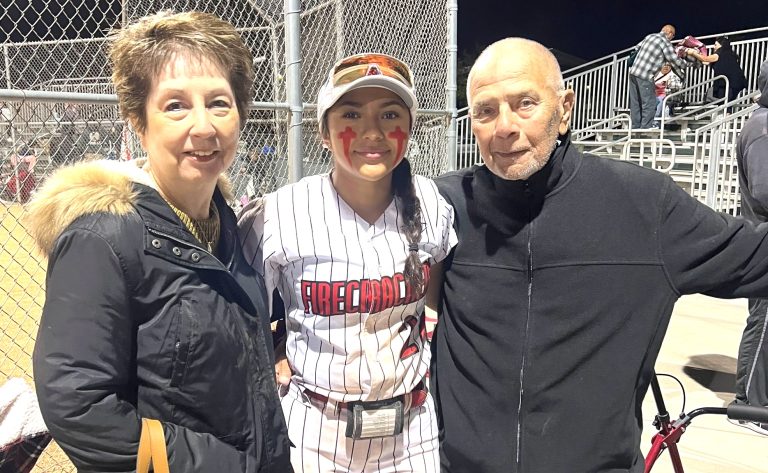 Ashlyn Pantages with her grandparents... her grandfather Ralph Osuna (right) recently passed away