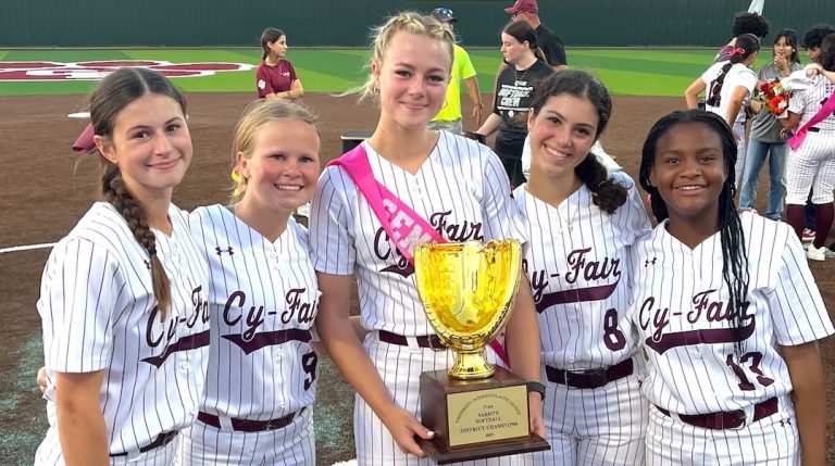 Claire (second from right) with her Cy-Fair teammates after the team won a district championship