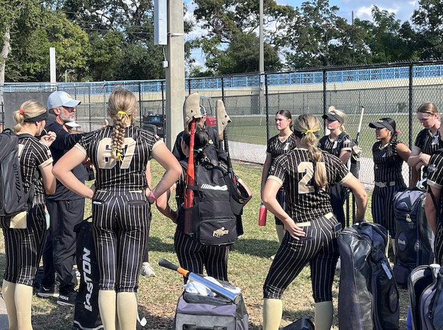 Greg Dickel speaks to the Iowa Premier team after the conclusion of Sunday's game at the Clearwater Fall Classic