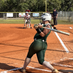 Rebecca Cunane, a 2029 pitcher:first baseman, connects for her Athletics Gold - Tamborra:Olson team
