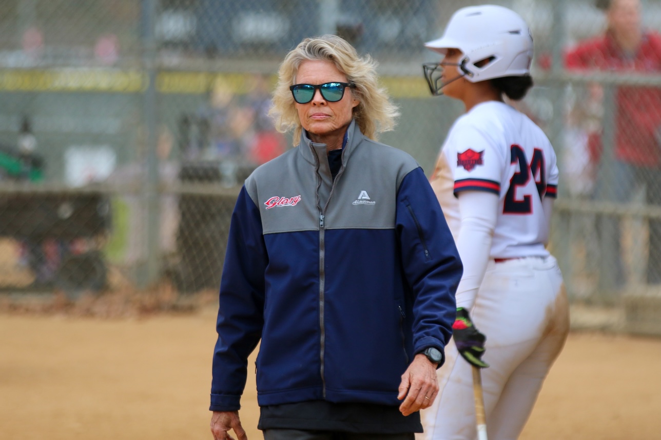 Coach Suzy Willemssen (sunglasses), who is being inducted into the NFCA Hall of Fame tonight (December 12, 2025)JPEG