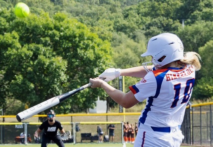 ACTION - 64 - Avery Hinkeldey connexts for a hit in action with her TN Mojo 2031 - Evans team