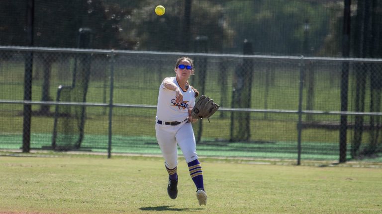 Avery Kate (AK) Wangaard, a Top 10 outfielder in the Class of 2031, makes a throw from the outfield for her Birmingham Thunderbolts - Tennyson team,