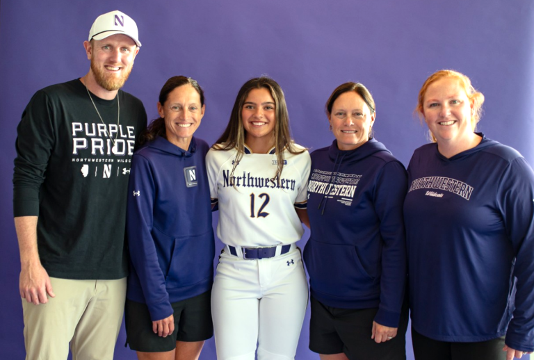 Kaimana on her campus visit to Northwestern pictured here with the Wildcat coaches