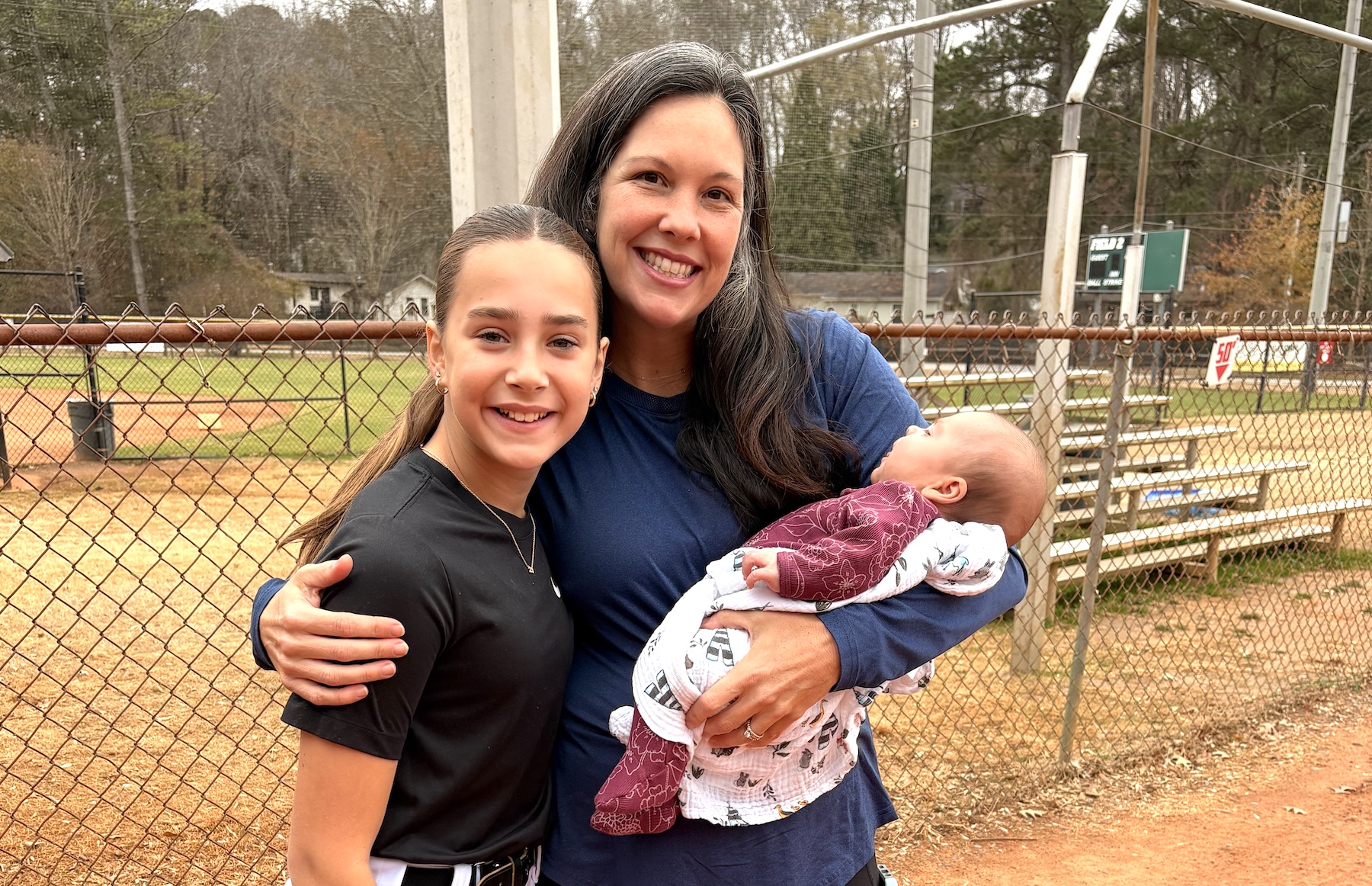 Jessica Bilz with baby Ruby and pitcher Cassidy Tartline who Jessica says is a future lefty stud!