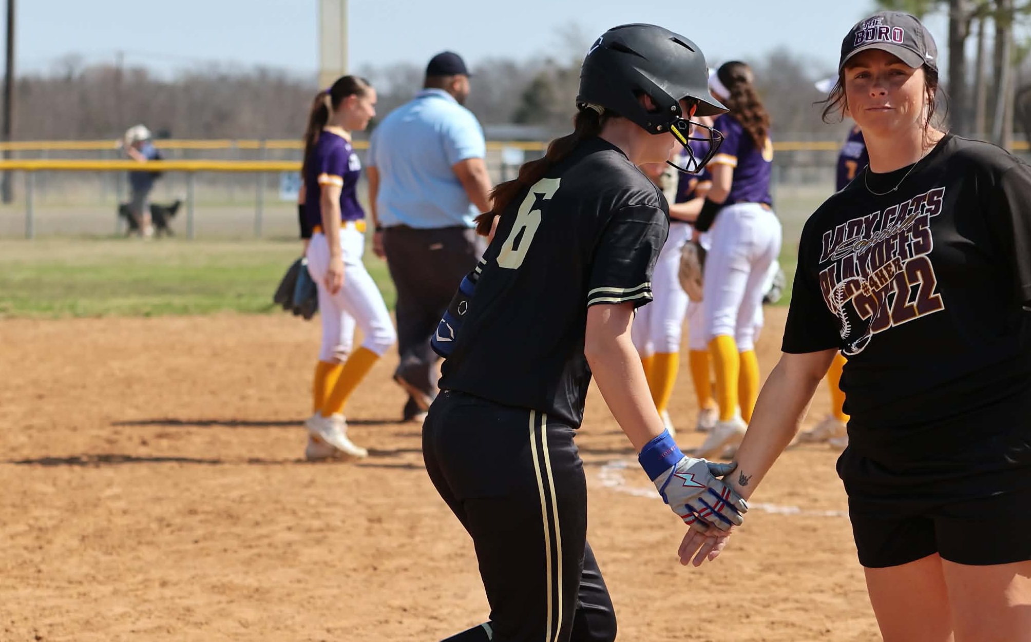 A familiar sight last week as Avery gets a low five after one of her seven home runs!