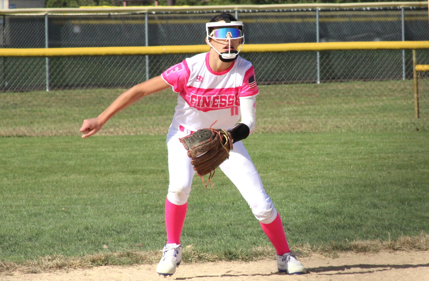 ACTION - 98 - Emmelina (Emme) Campos lookds to make a play for her Finesse Fastpitch 14U BRW team