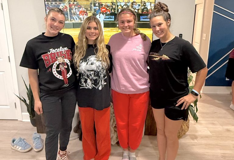 Helping Danika (far right) keep her spirits up is visiting with friends and former travel ball teammates. Pictured l-r Jocelyn & Ava Briski (Alabama) and Addison DeRoche (FSU commit)