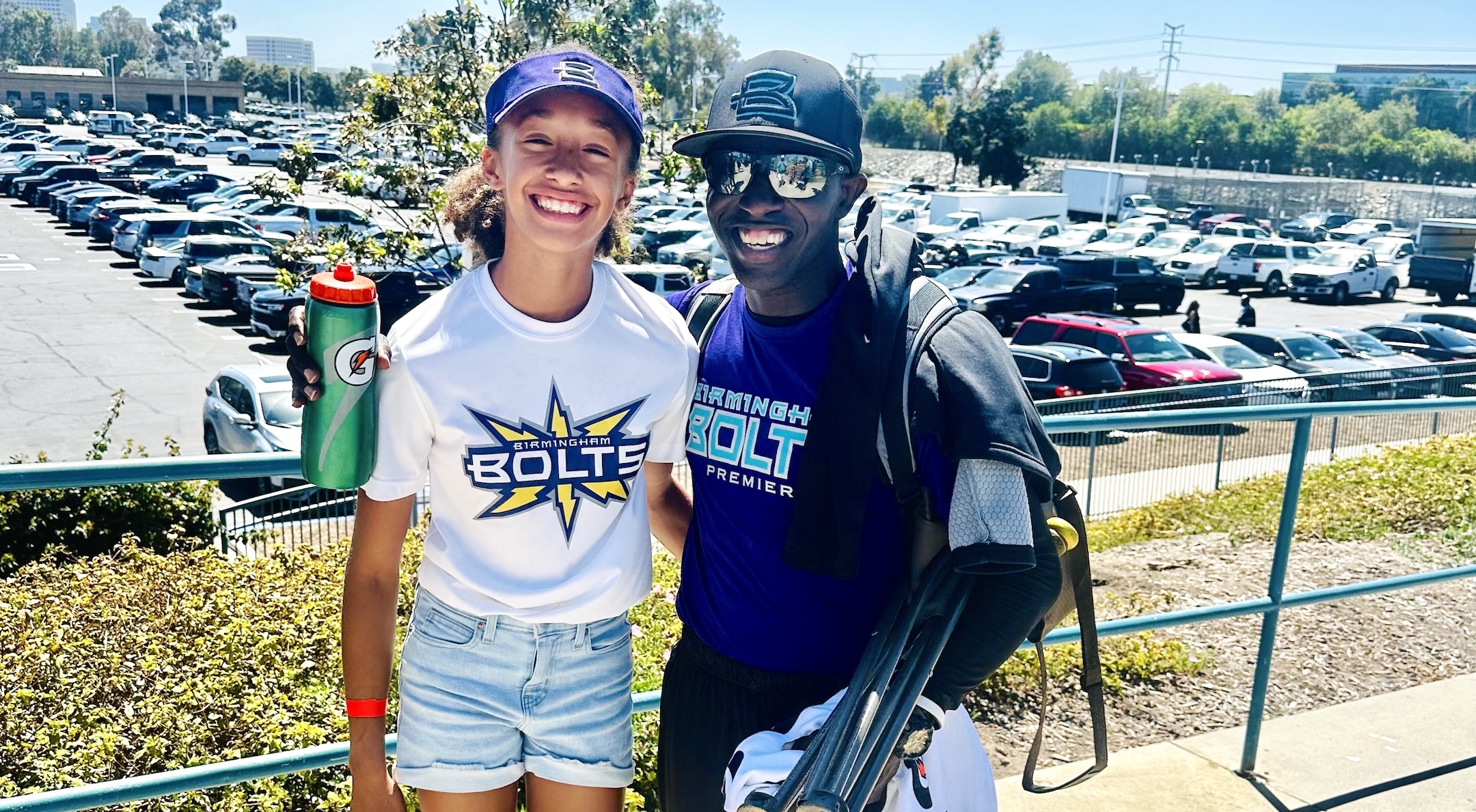 2031 pitcher Esther Young with Birmingham Thunderbotls head Rock Thompson