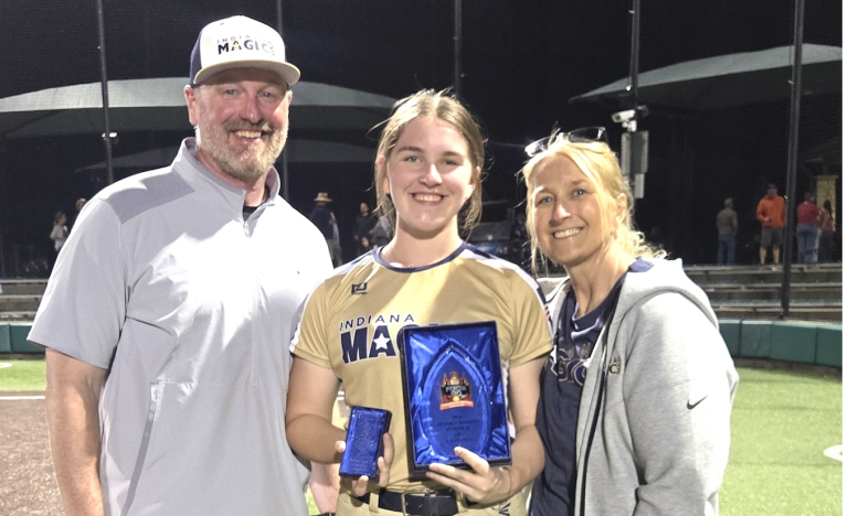 Chloe Taynor with her dad, David Taynor, and her mom, Heather Taynor after winning the PGF Super Select Bandits Power 80 Championship Game