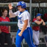 Karmen Vazquez flashes the L for LSU, her future college home, after hitting a home run last week for her Hanford (Calif.) West team