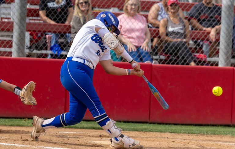 Karmen Vazquez showing the swing that allowed her to hit three home runs including a grand slam last week