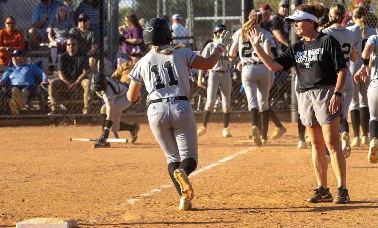 South Warren senior 3B:C Parker Willoughby circles the bases after a home run for the No. 1 Spartans
