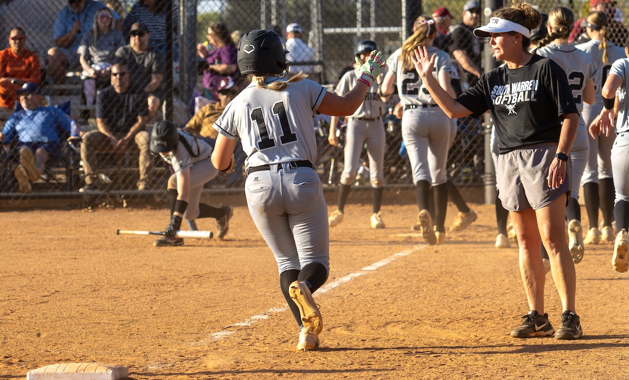 South Warren senior 3B:C Parker Willoughby circles the bases after a home run for the No. 1 Spartans