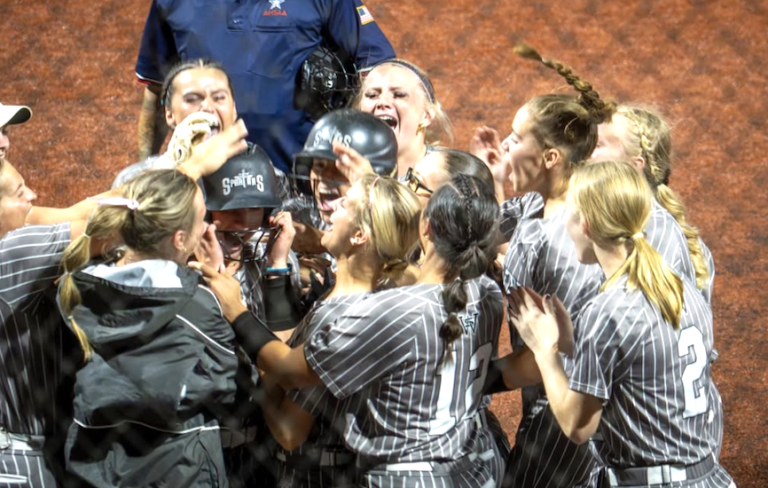 The South Warren High team celebrates after one of the three home runs hit the big win over Orange Beach High Thursday night