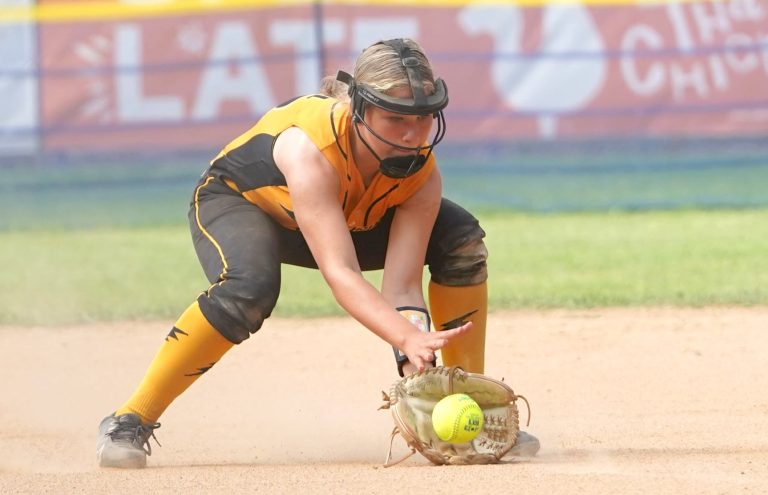 Infielder Emma Gaul from Downington, Pa. secures the ball in action with her Linville Lightning Gold team coached by David Kozak