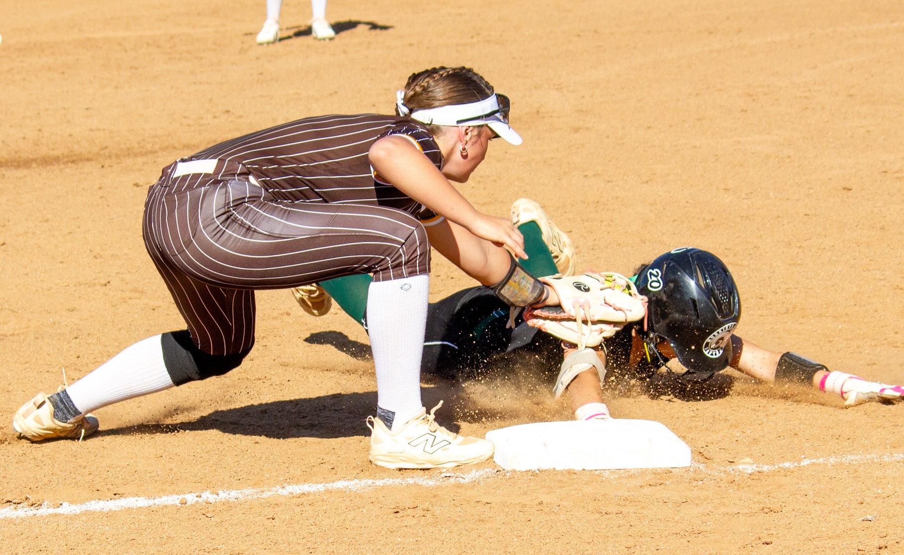 KK Williams slides in safetly ahead of tag