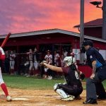 Molly Mayfield enjoys a beautiful sunset as she's back behind the plate