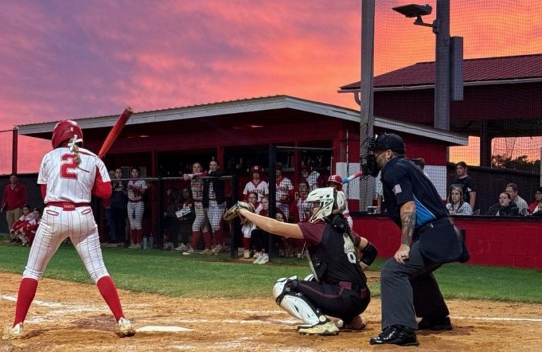 Molly Mayfield enjoys a beautiful sunset as she's back behind the plate
