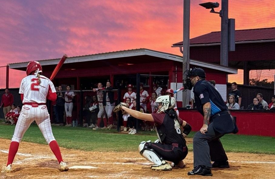 Molly Mayfield enjoys a beautiful sunset as she's back behind the plate