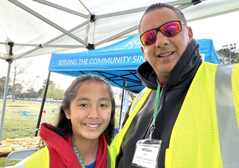 Samantha Wilson and her father William are together for softball but also volunteer to do community service together
