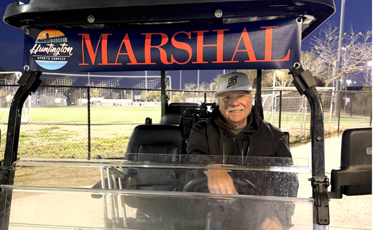 Chip Marchbank, the Executive Director of the Huntingon Beach Sports Complex, in his golf cart that gets him around the eight fields