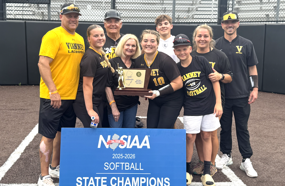 Head Coach Kim Lombardi-McDougall (second from right) and family