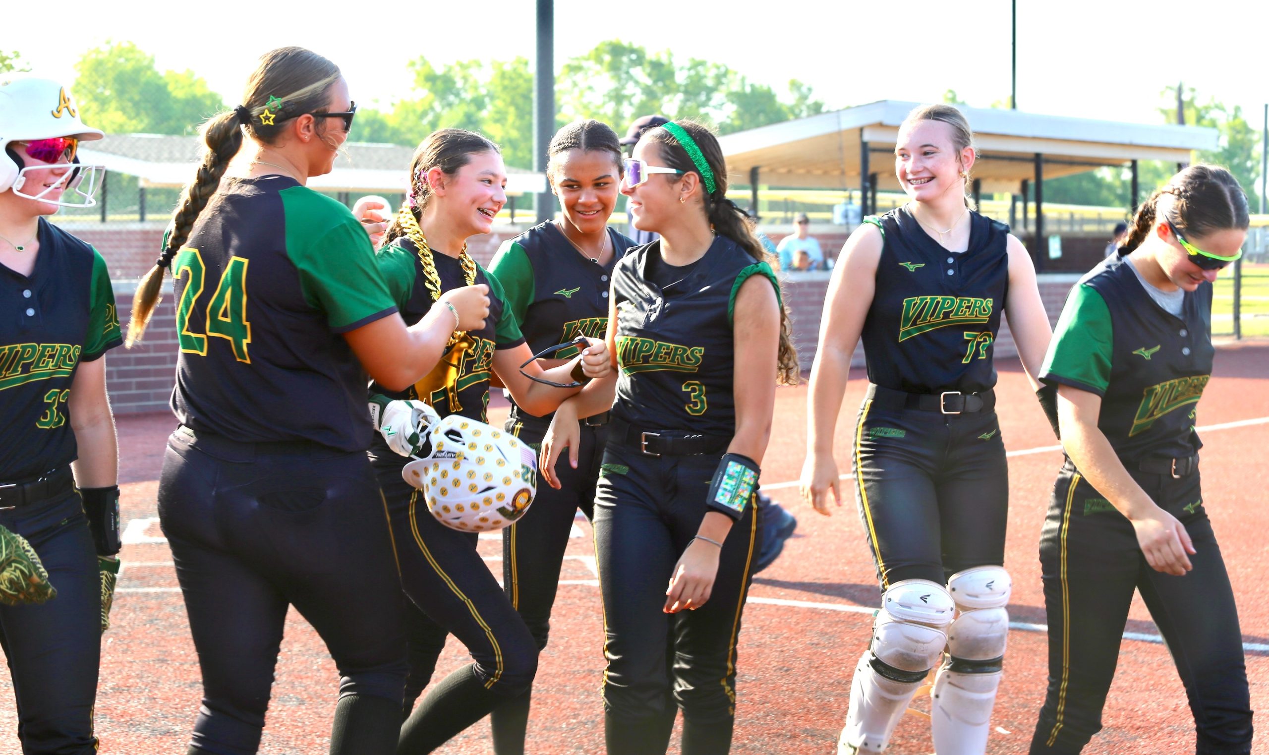 Our blogger extraordinaire, Kallaway Crenshaw (third from left), is congratulated by her Atlanta Vpers 12U - Kotula teammates after hitting a home run in Thursday's action at the 2026 AFCS