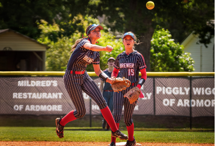 ACTION - Anabelle Anton makes a great leaping throw in the infield to get the out for her Fusion team