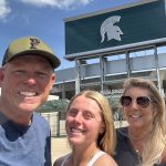 Teal Hamman and her parents at Michigan State's Secchia Stadium