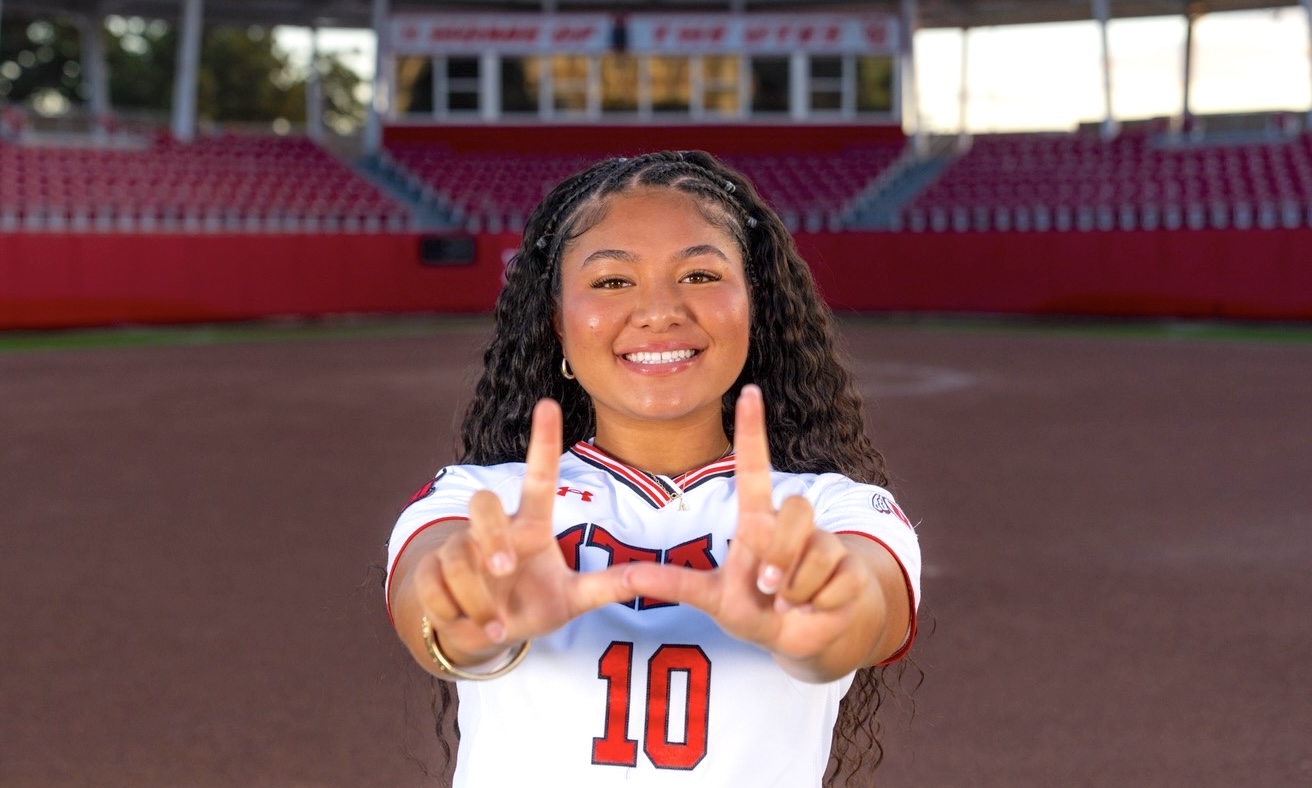 Nia Talataina is pictured "Flashing the U" on her official campus visit to the the University of Utah recently