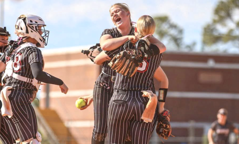 Players for Wheeler County High, the No. 1 seed in 1A, celebrate after beating Telfair High on Wednesday.jpg
