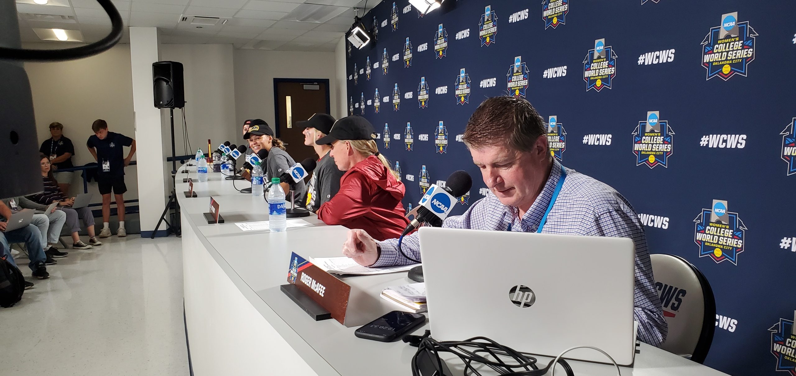 Roger McAfee served as the press conference moderator at the WCWS from 2018 to 2022
