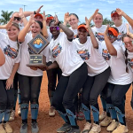The Siesta Key Phinz team celebrates after winning the 2026 FGCL tournament championship on July 11